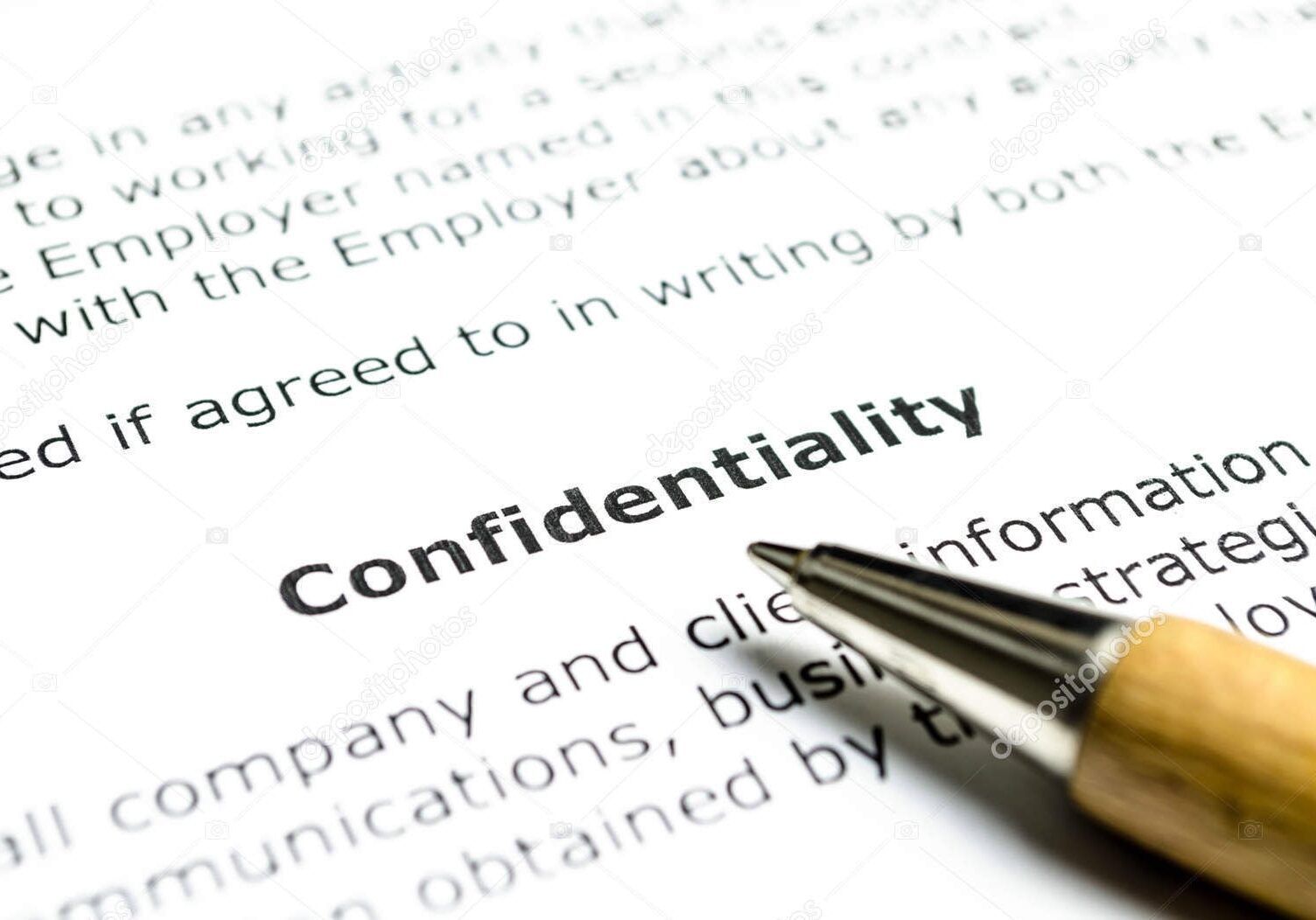 depositphotos_209426150-stock-photo-confidentiality-agreement-wooden-pen